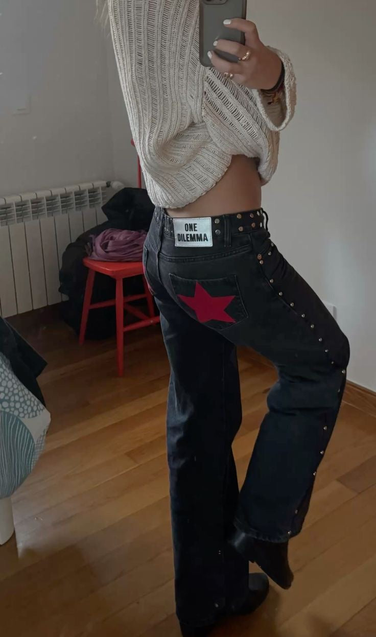 Jeans negros con estrellas rojas